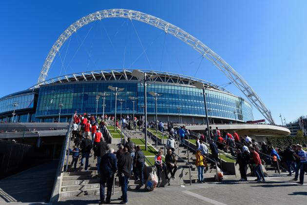 LONDON, ENGLAND - APRIL 18:  Fans make their way to the stadium ahead of the FA Cup Semi Final between Arsenal and Reading at Wembley Stadium on April 18, 2015 in London, England.  (Photo by Mike Hewitt/Getty Images)
