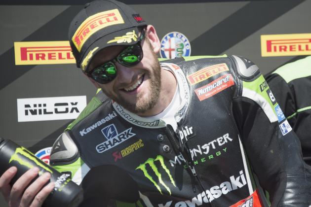 IMOLA, ITALY - MAY 10: Tom Sykes of Great Britain and Kawasaki Racing Team celebrates the second place under the podium at the end of the WSBK race 2 during the World Superbikes - Race at Enzo & Dino Ferrari Circuit on May 10, 2015 in Imola, Italy. (Photo by Mirco Lazzari gp/Getty Images)