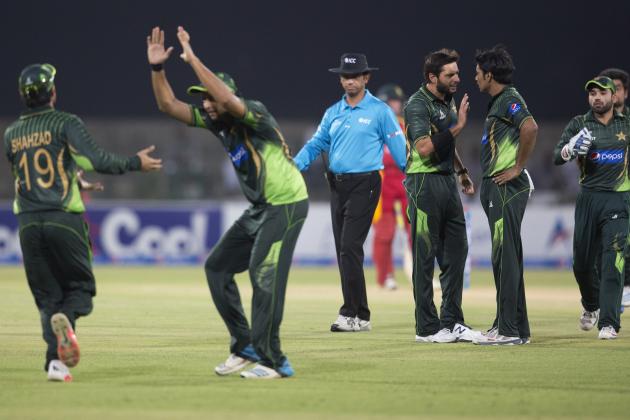 Pakistani players celebrate dismissal of Zimbabwe's Elton Chigumbura during a match at the Gaddafi Stadium in Lahore, Pakistan, Sunday, May 24, 2015. The Twenty20 matches Friday and Sunday mark a return of international cricket to Pakistan for the first time since gunmen attacked buses carrying the Sri Lankan cricket team and match officials in this eastern city six years ago. Security has been beefed up for the matches. (AP Photo/B.K. Bangash)