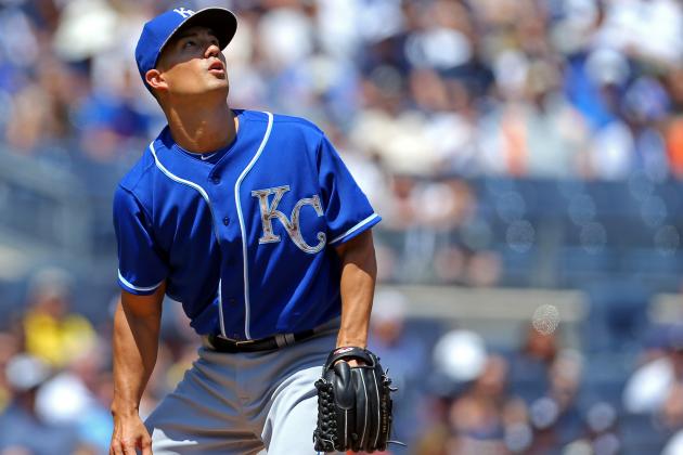 May 25, 2015; Bronx, NY, USA; Kansas City Royals starting pitcher Jeremy Guthrie (11) watches a two-run home run by New York Yankees third baseman Chase Headley (12) during the first inning at Yankee Stadium. Mandatory Credit: Adam Hunger-USA TODAY Sports