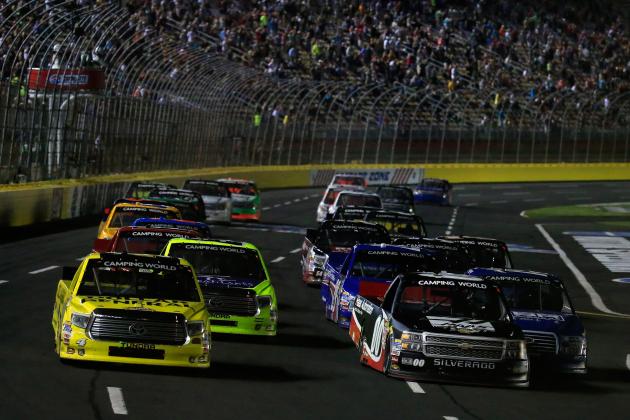 CHARLOTTE, NC - MAY 15: Kasey Kahne, driver of the #00 Haas Automation Chevrolet, and Erik Jones, driver of the #4 Dollar General Toyota, lead the field in a restart during the NASCAR Camping World Truck Series North Carolina Education Lottery 200 at Charlotte Motor Speedway on May 15, 2015 in Charlotte, North Carolina. (Photo by Chris Trotman/Getty Images)