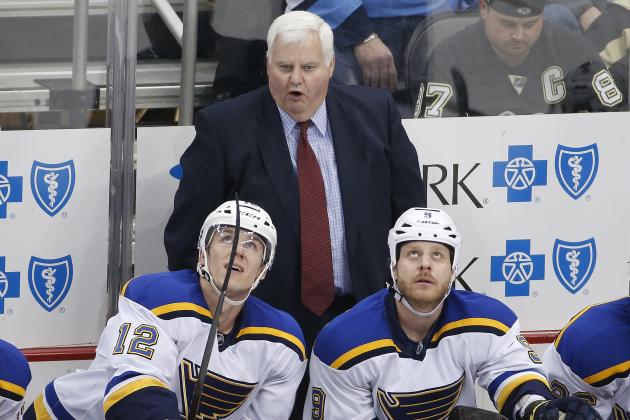 St. Louis Blues coach Ken Hitchcock stands behind his bench during the third period of an NHL hockey game against the Pittsburgh Penguins in Pittsburgh on Tuesday, March 24, 2015. The Blues won 3-2 in overtime. (AP Photo/Gene J. Puskar)