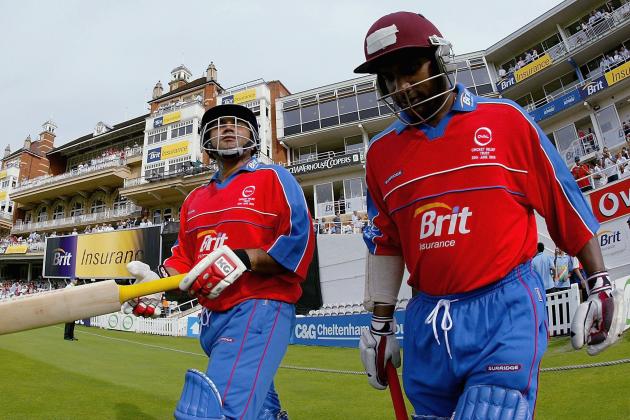 LONDON, GREAT BRITAIN - JUNE 20:  Sanath Jayasuriya and Virender Sehwag walk out to open the batting during the Tsunami Twenty20 relief game for The Oval Cricket Relief Trust, Asia XI against International XI at The Brit Oval on June 20, 2005 in London, England.  (Photo by Richard Heathcote/Getty Images)