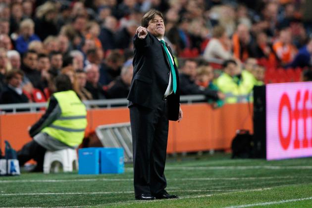 AMSTERDAM, NETHERLANDS - NOVEMBER 12:  Mexico Head Coach / Manager, Miguel Herrera gives his team instructions during the international friendly match between Netherlands and Mexico held at the Amsterdam ArenA on November 12, 2014 in Amsterdam, Netherlands.  (Photo by Dean Mouhtaropoulos/Getty Images)