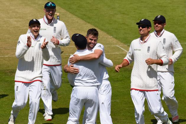 LEEDS, ENGLAND - MAY 29:  James Anderson of England celebrates with Jos Butler after dismissing New Zealand batsman Kane Williamson to claim his 401st test match wicket during day one of the 2nd Investec test match between England and New Zealand at Headingley on May 29, 2015 in Leeds, England.  (Photo by Stu Forster/Getty Images)