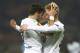 MILAN, ITALY - MARCH 19: Daniel Caligiuri (L) of VfL Wolfsburg celebrates with his teammate Kevin De Bruyne after scoring the opening goal during the UEFA Europa League Round of 16 match between FC Internazionale Milano and VfL Wolfsburg at Stadio Giuseppe Meazza on March 19, 2015 in Milan, Italy. (Photo by Marco Luzzani/Getty Images)