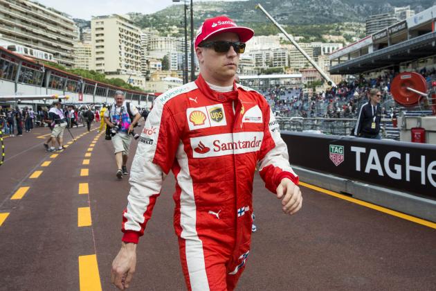 Ferrari driver Kimi Raikkonen of Finland walks through the pit lane after the first practice session at the Monaco racetrack, in Monaco, Thursday, May 21, 2015. The Formula One Grand Prix of Monaco will be held on Sunday. (AP Photo/Gero Breloer)