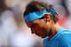 PARIS, FRANCE - JUNE 03: Rafael Nadal of Spain looks on in his Men's quarter final match against Novak Djokovic of Serbia on day eleven of the 2015 French Open at Roland Garros on June 3, 2015 in Paris, France. (Photo by Clive Brunskill/Getty Images)
