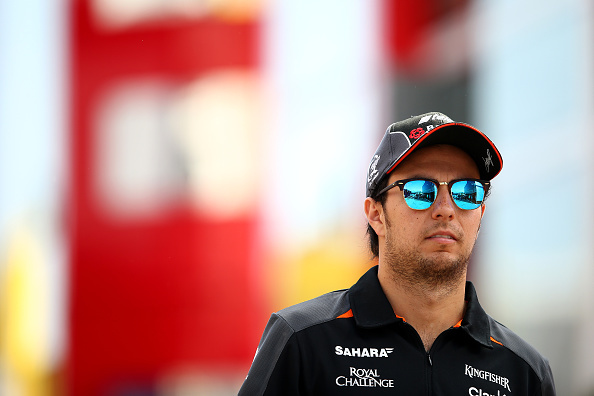 MONTMELO, SPAIN - MAY 08:  Sergio Perez of Mexico and Force India walks through the paddock during practice for the Spanish Formula One Grand Prix at Circuit de Catalunya on May 8, 2015 in Montmelo, Spain.  (Photo by Mark Thompson/Getty Images)