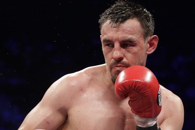 This Saturday, May 4, 2013 photo shows Robert Guerrero during his WBC welterweight title fight against Floyd Mayweather Jr. in Las Vegas. The boxer, who had been arrested at a New York City airport on gun charges, has pleaded guilty to disorderly conduct on Tuesday, May 14, 2013. He was ordered to pay a $250 fine and complete 50 hours of community service. Guerrero lives in California and will be able to perform the community service in his home state. (AP Photo/Rick Bowmer)