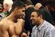 Britain's Amir Khan, left, celebrates his victory with Naseem Hamed, right, following his WBA light-welterweight title fight against Dmitriy Salita, of the U.S. in Newcastle, England on Saturday, Dec. 5, 2009. (AP Photo/Scott Heppell)