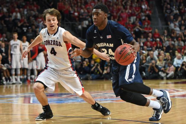 LAS VEGAS, NV - MARCH 10:  Frank Bartley IV #24 of the Brigham Young Cougars drives against Kevin Pangos #4 of the Gonzaga Bulldogs during the championship game of the West Coast Conference Basketball tournament at the Orleans Arena on March 10, 2015 in Las Vegas, Nevada. Gonzaga won 91-75.  (Photo by Ethan Miller/Getty Images)