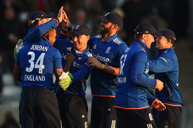 BIRMINGHAM, ENGLAND - JUNE 09: Jos Buttler of England congratulates Chis Jordan after taking the final wicket during the 1st ODI Royal London One-Day Series 2015 match between England and NewZealand at Edgbaston on June 9, 2015 in Birmingham, England. (Photo by Shaun Botterill/Getty Images)
