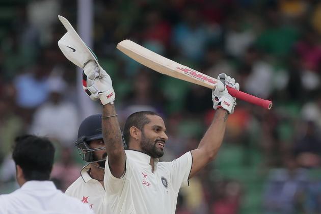 India’s Shikhar Dhawan, acknowledges the crowd after scoring a hundred runs during the first day of their test cricket match against Bangladesh in Fatullah, Bangladesh, Wednesday, June 10, 2015. (AP Photo/A.M. Ahad)