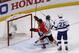 Chicago Blackhawks' Andrew Shaw (65) celebrates after teammate Brad Richards scored past Tampa Bay Lightning goalie Ben Bishop and Matt Carle (25) during the first period in Game 3 of the NHL hockey Stanley Cup Final on Monday, June 8, 2015, in Chicago. (AP Photo/Charles Rex Arbogast)