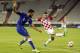Italy's Antonio Candreva, left, is challenged by Croatia's Danijel Pranjic during the Euro 2016 Group H qualifying soccer match between Croatia and Italy, in Split, Croatia, Friday, June 12, 2015. (AP Photo/Darko Bandic)