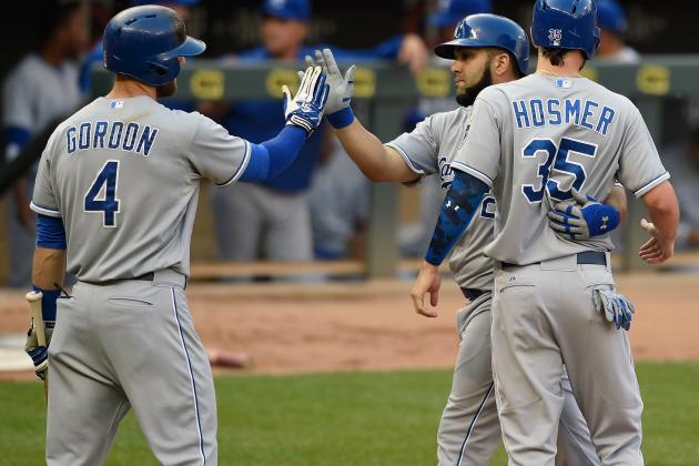 MINNEAPOLIS, MN - JUNE 8: Alex Gordon #4 and Eric Hosmer #35 of the Kansas City Royals congratulate teammate Kendrys Morales #25 after a two-run home run against the Minnesota Twins during the second inning of the game on June 8, 2015 at Target Field in Minneapolis, Minnesota. (Photo by Hannah Foslien/Getty Images)