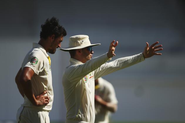 KINGSTON, JAMAICA - JUNE 12:  Michael Clarke of Australia speaks to Mitchell Starc of Australia during day two of the Second Test match between Australia and the West Indies at Sabina Park on June 12, 2015 in Kingston, Jamaica.  (Photo by Ryan Pierse/Getty Images)