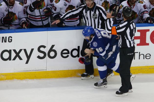 Jun 13, 2015; Tampa, FL, USA; Tampa Bay Lightning right wing Nikita Kucherov (86) is helped off the ice after a collision with Chicago Blackhawks goalie Corey Crawford (not pictured) in the first period game five of the 2015 Stanley Cup Final at Amalie Arena. Mandatory Credit: Reinhold Matay-USA TODAY Sports