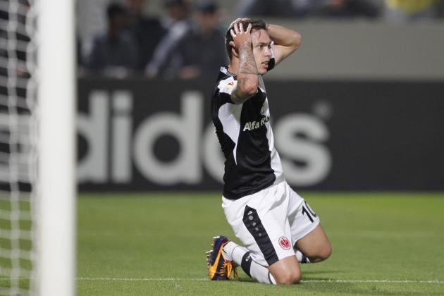 Eintracht Frankfurt's Vaclav Kadlec holds his head during the Europa League group F soccer match against Maccabi Tel Aviv in Bloomfield stadium in Tel Aviv, Israel, Thursday, Nov. 7, 2013. Maccabi won 4-2. (AP Photo / Ariel Schalit)