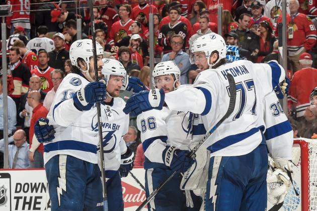 CHICAGO, IL - JUNE 08:  (L-R) Brian Boyle #11, Anton Stralman #6, Nikita Kucherov #86 and Victor Hedman #77 of the Tampa Bay Lightning celebrate after defeating the Chicago Blackhawks 3-2 during Game Three of the 2015 NHL Stanley Cup Final at the United Center on June 8, 2015 in Chicago, Illinois.  (Photo by Bill Smith/NHLI via Getty Images)