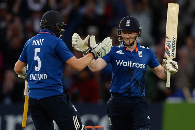NOTTINGHAM, ENGLAND - JUNE 17:  England captain Eoin Morgan celebrates with Joe Root after reaching his century during the 4th ODI Royal London One-Day match between England and New Zealand at Trent Bridge on June 17, 2015 in Nottingham, England.  (Photo by Gareth Copley/Getty Images)