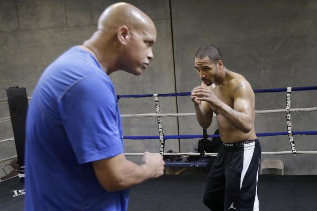 In this June 1, 2015 photo, Andre Ward, right, works out with trainer Virgil Hunter in Hayward, Calif. Super Middleweight champion Andre Ward is ready for his 19-month layoff to come to an end Saturday, June 20, 2015, when he takes on England's Paul Smith in a non-title fight. (AP Photo/Jeff Chiu)