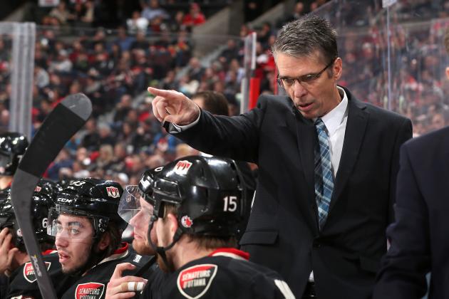 OTTAWA, ON - DECEMBER 11: Dave Cameron gives instructions as he makes his debut behind the bench of the Ottawa Senators as head coach in an NHL game against the Los Angeles Kings at Canadian Tire Centre on December 11, 2014 in Ottawa, Ontario, Canada.  (Photo by Andre Ringuette/NHLI via Getty Images)