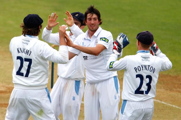 DERBY, ENGLAND - SEPTEMBER 13: Mark Footitt (C) of Derbyshire celebrates with team mates after taking the wicket of Durham's Will Smith (not pictured) during the LV County Championship match between Derbyshire and Durham at The County Ground on September 13, 2013 in Derby, England. (Photo by Paul Thomas/Getty Images)