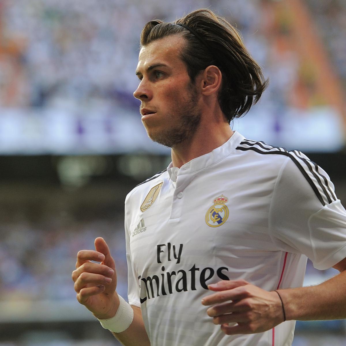 Real Madrid Midfielder, Gareth Frank Bale - BALE, number 11 celebrates with  James Rodriguez after