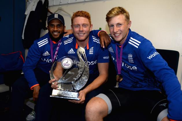 CHESTER-LE-STREET, ENGLAND - JUNE 20:  Adil Rashid, Jonathan Bairstow and Joe Root of England celebrate in the dressing room after winning the 5th ODI Royal London One-Day match between England and New Zealand at Emirates Durham ICG on June 20, 2015 in Chester-le-Street, England.  (Photo by Gareth Copley/Getty Images)