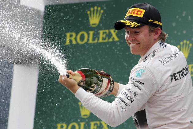 Mercedes driver Nico Rosberg of Germany celebrates his victory following the Austrian Formula One Grand Prix race in Spielberg, southern Austria, Sunday, June 21, 2015. (AP Photo/Ronald Zak)