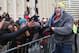 BOSTON, MA - FEBRUARY 04: Tight end Rob Gronkowski of the New England Patriots high fives fans during a Super Bowl victory parade on February 4, 2015 in Boston, Massachusetts. The Patriots defeated the Seattle Seahawks 28-24 in Super Bowl XLIX. (Photo by Billie Weiss/Getty Images)