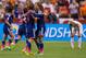 VANCOUVER, BC - JUNE 23: Mizuho Sakaguchi #6 and Rumi Utsugi #13 of Japan celebrate at the final whistle after defeating the Netherlands 2-1 during the FIFA Women's World Cup Canada 2015 Round of 16 match between the Netherlands and Japan June, 23, 2015 at BC Place Stadium in Vancouver, British Columbia, Canada. (Photo by Rich Lam/Getty Images)
