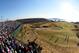 Grandstands and hospitality tents walled off spectators from the final hole.