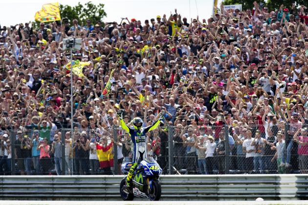 Valentino Rossi celebrates on his Yamaha after winning the Dutch MotoGP Grand Prix, in Assen, northern Netherlands, Saturday, June 27, 2015. (AP Photo/Vincent Jannink)