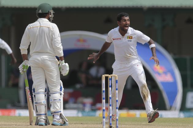 Sri Lankan bowler Dhammika Prasad celebrates taking the wicket of Pakistan's batsman Sarfraz Ahmed during the fourth day's play of their second test cricket match, in Colombo, Sri Lanka, Sunday, June 28, 2015. (AP Photo/Eranga Jayawardena)
