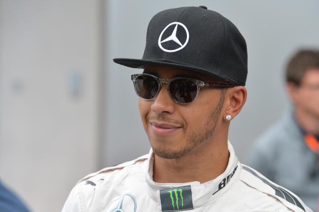 Mercedes driver Lewis Hamilton of Britain walks away after the second training session prior to the Formula One Grand Prix, at the Red Bull Ring in Spielberg, southern Austria, Friday, June 19, 2015. (AP Photo/Kerstin Joensson)