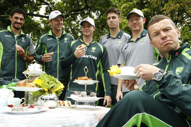 Australian cricketers Nathan Lyon, left, Mitchel Starc, Josh Hazlewood, Steve Smith, Mitchel March, George Bailey and Peter Siddle, right, pose for the TV and photographers during a media event in London, Tuesday, June 23, 2015. The Australian cricket team is in Britain to play a five test series of matches against England for the Ashes, starting with the first test in Cardiff, Wales, July 8. (AP Photo/Alastair Grant)