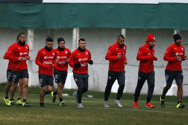 Chile players jog during a team training session in Santiago, Chile, Thursday, July 2, 2015. Chile will face Argentina in the Copa America final on Saturday. (AP Photo/Luis Hidalgo)