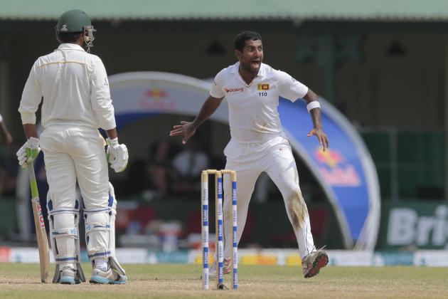 Sri Lankan bowler Dhammika Prasad celebrates taking the wicket of Pakistan's batsman Sarfraz Ahmed during the fourth day's play of their second test cricket match, in Colombo, Sri Lanka, Sunday, June 28, 2015. (AP Photo/Eranga Jayawardena)