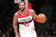 WASHINGTON, DC - DECEMBER 27: Nene Hilario #42 of the Washington Wizards drives up the court against the Boston Celtics during the game on December 27, 2014 at Verizon Center in Washington, District of Columbia. NOTE TO USER: User expressly acknowledges and agrees that, by downloading and or using this Photograph, user is consenting to the terms and conditions of the Getty Images License Agreement. Mandatory Copyright Notice: Copyright 2014 NBAE (Photo by Ned Dishman/NBAE via Getty Images)