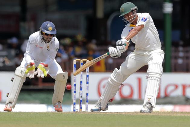 Pakistan's Younis Khan plays a shot as Sri Lanka's wicketkeeper Dinesh Chandimal watches during the first day of the second test cricket match between them in Colombo, Sri Lanka,Thursday, June 25, 2015. (AP Photo/Eranga Jayawardena)