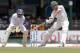Pakistan's Younis Khan plays a shot as Sri Lanka's wicketkeeper Dinesh Chandimal watches during the first day of the second test cricket match between them in Colombo, Sri Lanka,Thursday, June 25, 2015. (AP Photo/Eranga Jayawardena)