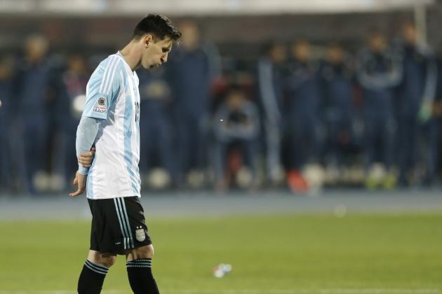 Argentina's Lionel Messi reacts after Argentina's Gonzalo Higuain missed his penalty kick against Chile  during the Copa America final soccer match at the National Stadium in Santiago, Chile, Saturday, July 4, 2015. (AP Photo/Ricardo Mazalan)