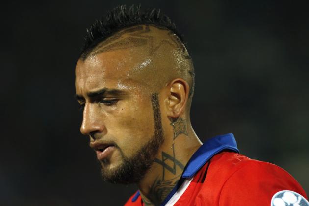 Chile's Arturo Vidal leaves the field after the first half of a Copa America Group A soccer match against Bolivia at El Nacional stadium in Santiago, Chile, Friday, June 19, 2015. Vidal was banned from driving for four months by a Chilean judge on Wednesday after he crashed his Ferrari while driving under the influence of alcohol. Despite the judge's ruling, Chile national team coach Jorge Sampaoli said Vidal would continue to play for the team.(AP Photo/ Luis Hidalgo)