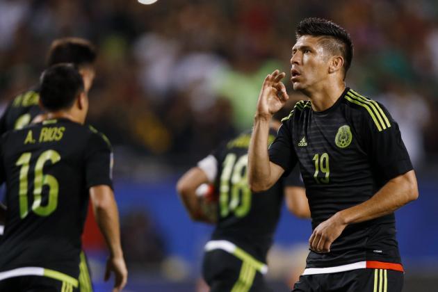 Mexico forward Oribe Peralta (19) celebrates a goal against Cuba during the first half of a CONCACAF Gold Cup soccer match, Thursday, July 9, 2015, in Chicago. Mexico won 6-0. (AP Photo/Andrew A. Nelles)