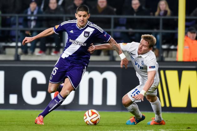 RSC Anderlecht player Aleksandar Mitrovic, left, challenges Dynamo Moscow player Tomas Hubocan during their Europa League Round of 32 first leg match at Constant Vanden Stock Stadium in Brussels on Thursday Feb. 19, 2015. (AP Photo/Geert Vanden Wijngaert)