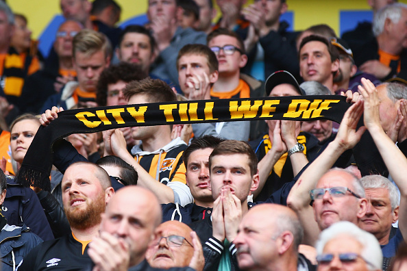 HULL, ENGLAND - MAY 24: Hull City supporters show their dejection after their team was relegated from the Premier League after the Barclays Premier League match between Hull City and Manchester United at KC Stadium on May 24, 2015 in Hull, England. (Photo by Matthew Lewis/Getty Images)