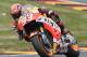 Spain’s Marc Marquez rides his Honda during the MotoGP race at the Sachsenring circuit in Hohenstein-Ernstthal, Germany, Sunday, July 12, 2015. (AP Photo/Jens Meyer)